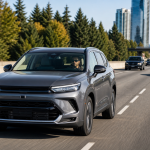 Gray modern SUV driving on a city highway with skyscrapers in the background